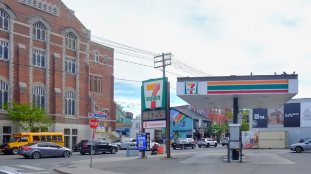 7 Eleven gas station on the southeast corner of Queen Street West and Walnut Ave., with St. Nicholas Ukrainian RC Church across the street