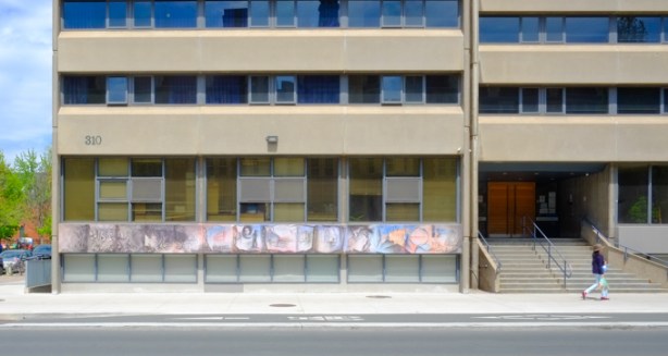 front, and entrance of, tartu college, a highrose student residence on bloor street, made of concrete in the 1970s