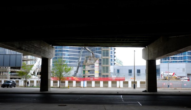 looking under gardiner to site of demolition of multi level car park