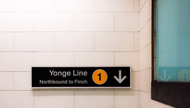 sign at Union Station, with arrow pointing down towards stairs down to Yonge Line on TTC subway, 