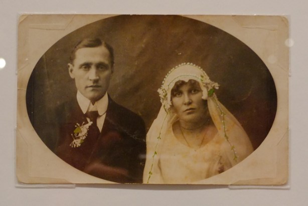 bride and groom, bride with head covering typical of roaring 20's