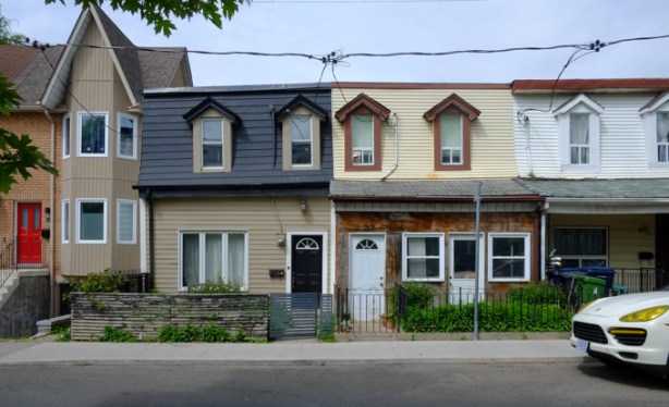 a row of houses on Shaw street, mansour roofs, two storey, 