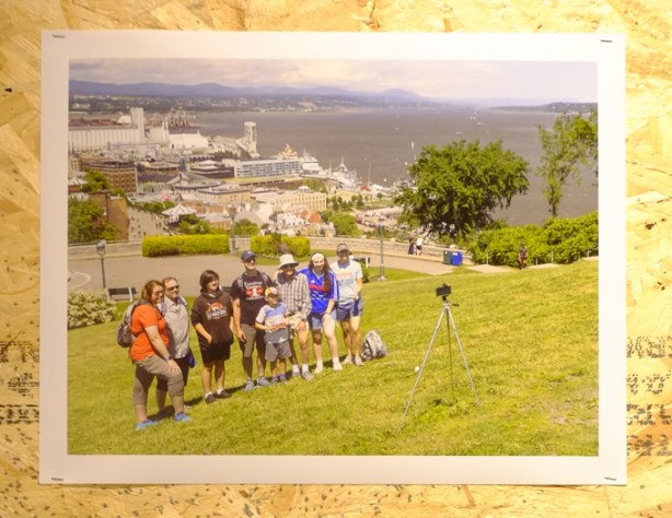 group photo, on a hill above a small town