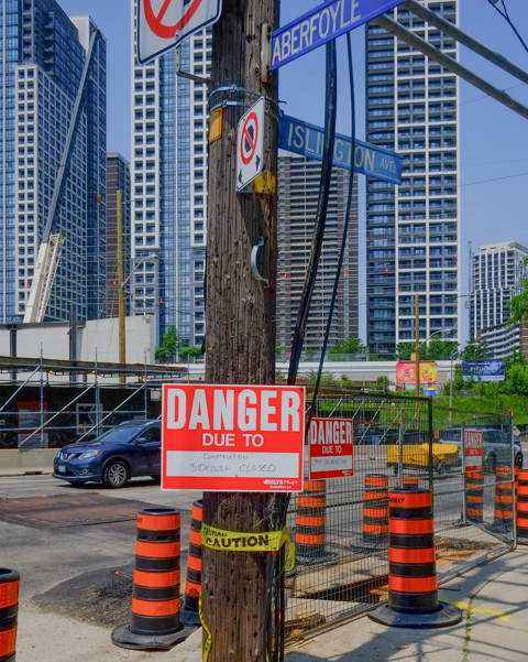 danger due to construction sign at the corner of Aberfoyle ad Islington