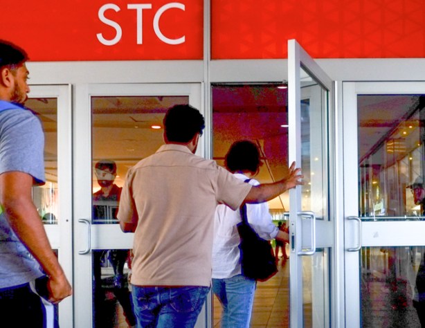 people opening doors going into Scarborough Town Centre