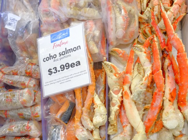 crab legs and salmon pieces for sale at st lawrence market