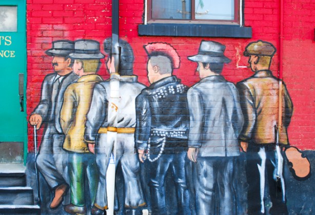 mural, line up of men wanting to enter the duke tavern