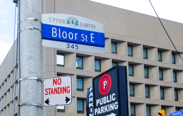 city of toronto street sign for bloor street east, with header of upper jarvis