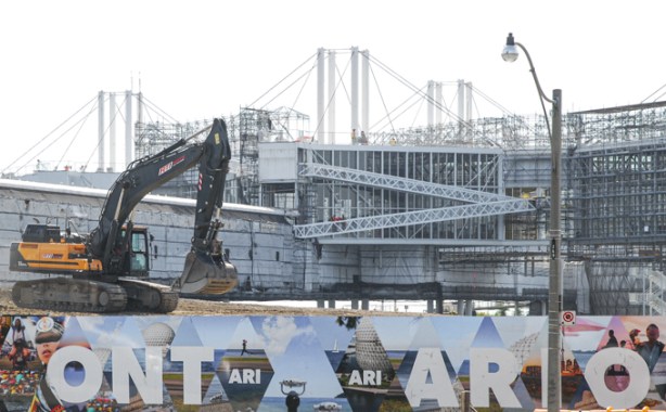 ontario place under renovation, digger working behind hoardings
