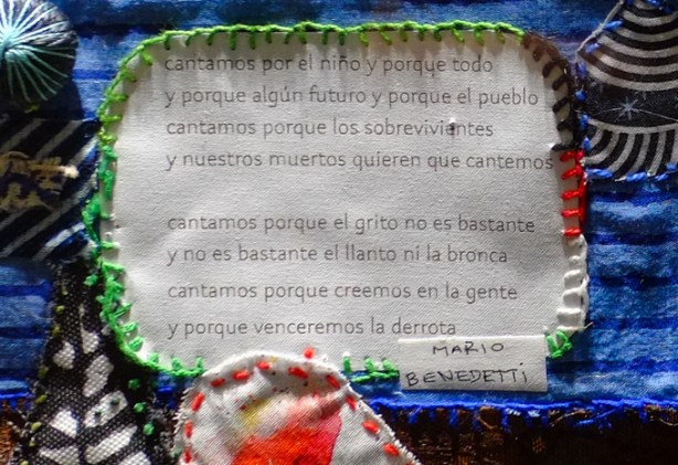 words printed on white fabric in a fabric artwork