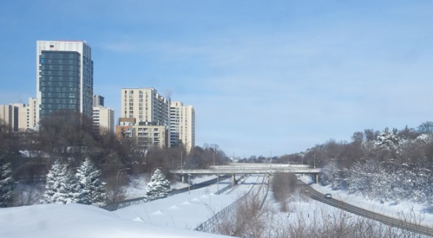 looking north up Allen Road from Eglinton, winter, snow covered, very littl traffic, highrise buildings on the west side the the Allen