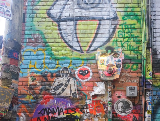 urban ninja squadron and others, graffiti on a wall in graffiti alley