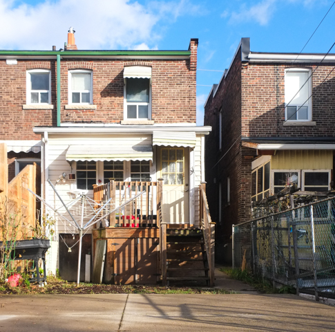 back of 2 houses, alley view