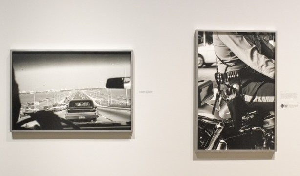 two black and white photos on a gallery wall,