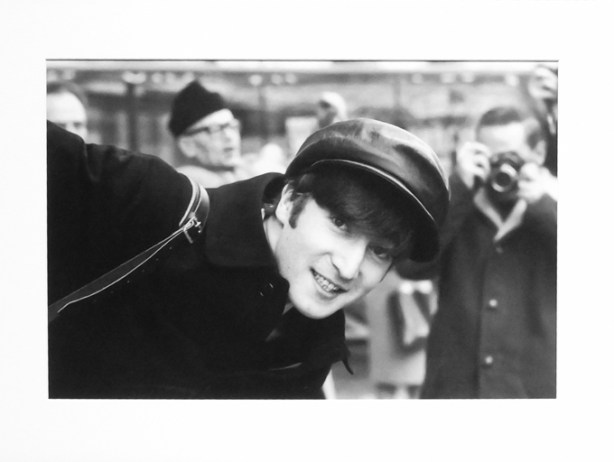 photo of John Lennon, taken in paris france 1964, taken by paul mccartney, black and white