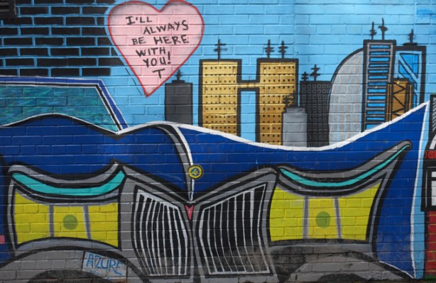 street art mural, with pink heart, words in heart say I will always be here with you.