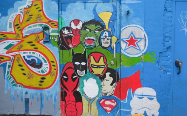street art mural showing some comic book superheroes