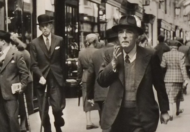 closer up view of people on the street, in a post war, London England, black and white photo by Inge Morath