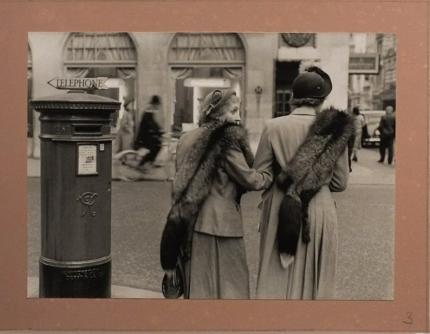 post war, London England, black and white photo by Inge Morath of two women on New Bond Street, both wearing fox stoles around their necks