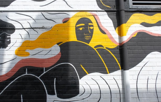 part of a mural by ness lee, black woman with long yellow hair 