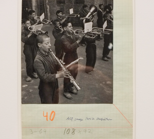 black and white photo by David Seymour, children playing musical instruments, trumpets and clarinets 