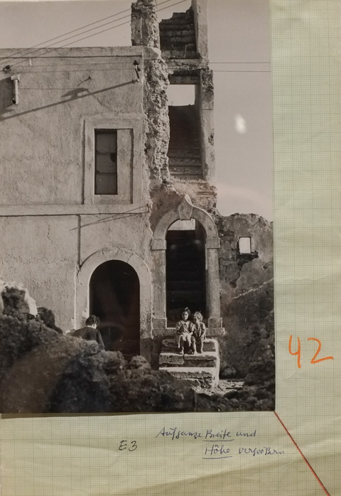 black and white photo by David Seymour, bombed house, ruined