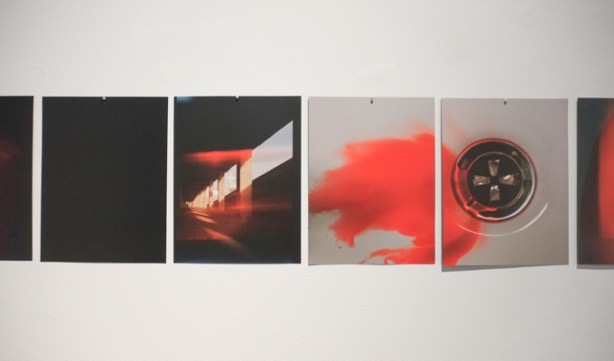 photography, at a gallery, exhibit titled Aphasia, by James Andrew Rosen, mostly red and black