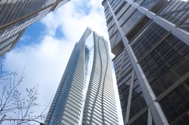looking skyward at yonge and bloor, stops of three glass towers