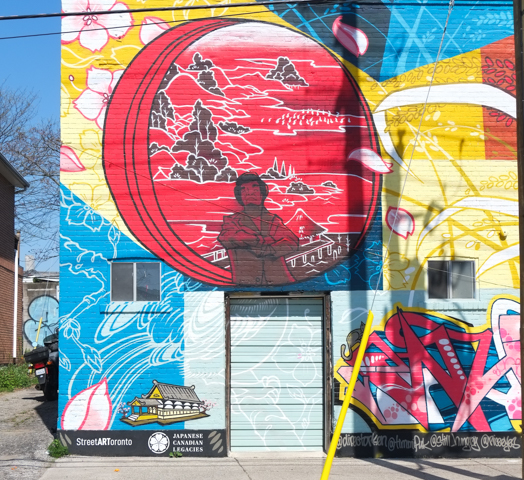 a portion of Japan Town 5 mural on the side of Sanko Trading Company store on Queen Street West