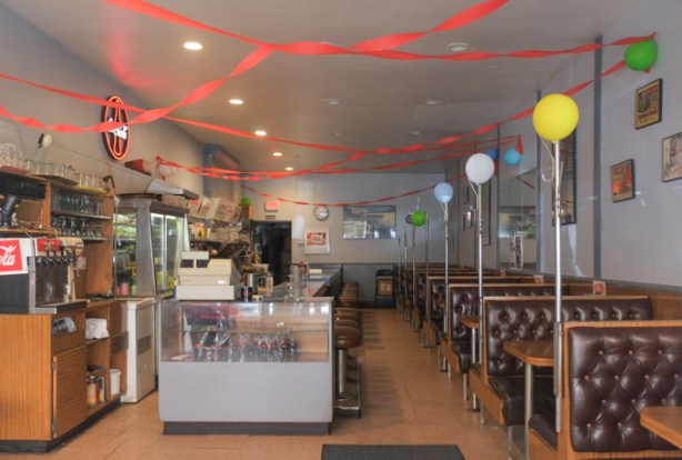 patrician grill, interior, as seen through glass doors after closing for the last time