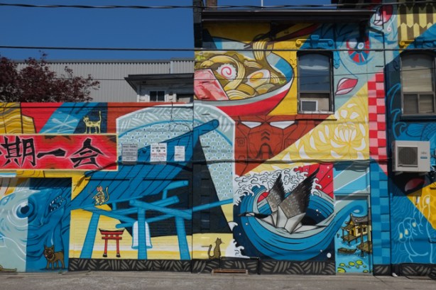 a portion of Japan Town 5 mural on the side of Sanko Trading Company store on Queen Street West