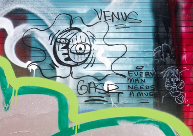 graffiti with words Venus, every man needs a muse