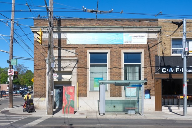 old bank building, now for sale, on Coxwell Avenue