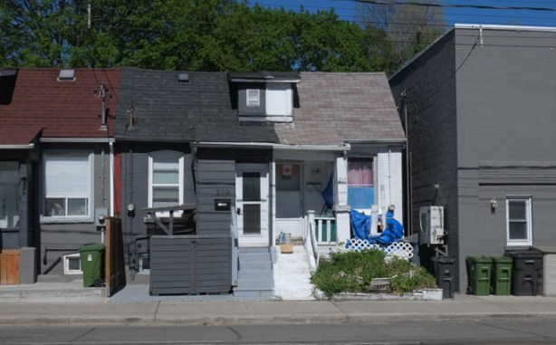 three small houses squished together on coxwell avenue