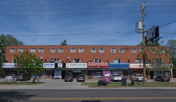 red brick strip mall on Wilson Avenue