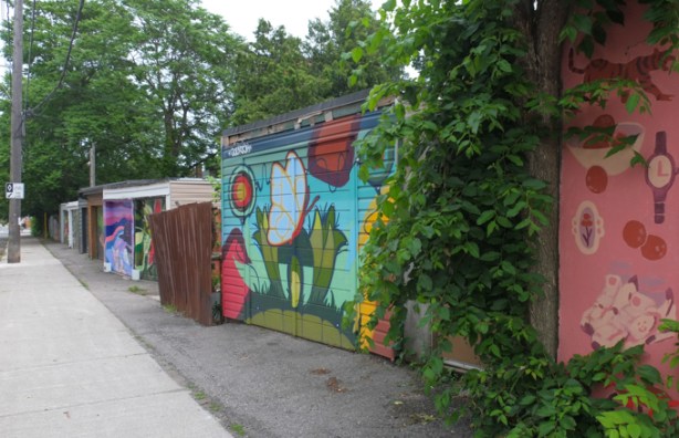street art murals by que rock and jarus on dundas street east