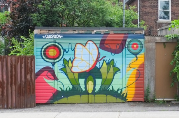 mural by que rock, flowers and native symbols