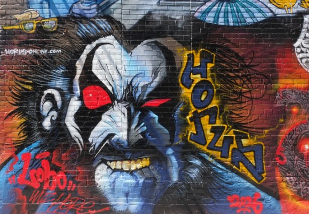 evil villain face with red eye, white wrinkly skin, yellow teeth, graffiti on a wall in graffiti alley, by horus, 