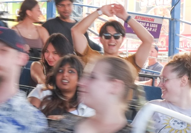 young people on a ride, midway at Canadian National Exhibition