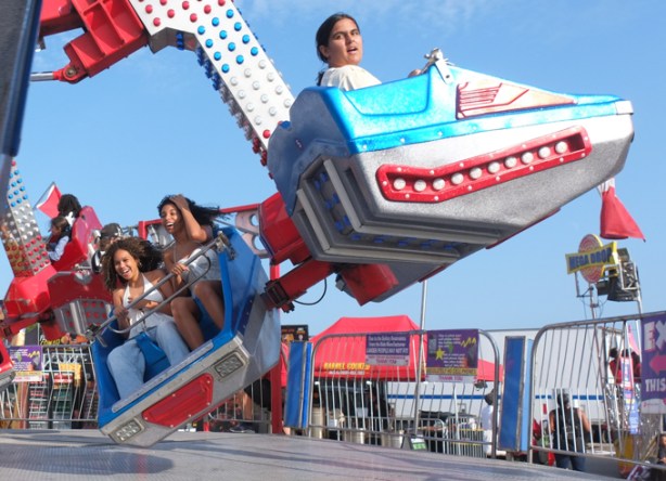 young women on a midway ride, canadian national exhibition