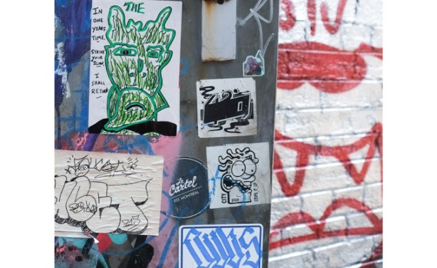 stickers and paste ups, graffiti alley