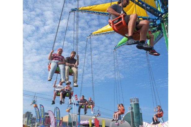 some of the people on a swing ride at the cne