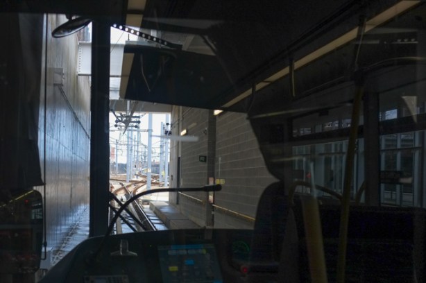looking out of the window at the front of an LRT station as it is parked at Mount Dennis station