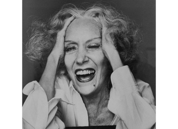 Gloria Swanson, 1980, black and white portrait photograph by Richard Avedon hanging on a wall in a gallery, TMU Image Centre