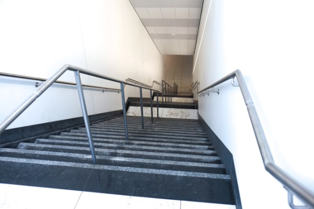 steep and long stairwell down at Keelesdale LRT station