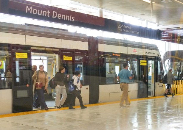 people getting off train at Mount Dennis LRT station