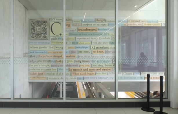 view through glass of Up to This Moment which is an art installation created by artists Hadley and Maxwell.  It is made of words.