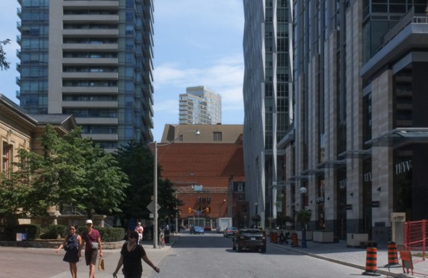 looking east on Yorkville Ave towards Yonge Street with the Toronto Reference Library at the end of the street