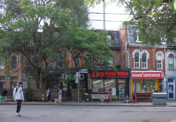 few businesses on Howard St., in old brick houses, including Apo Filipino restaurant and Howard convenience store