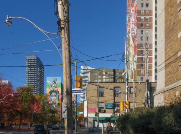 north side of Carleton Street, looking west from Homewood, mural straight ahead, and mural on the right on 140 Carleton Street